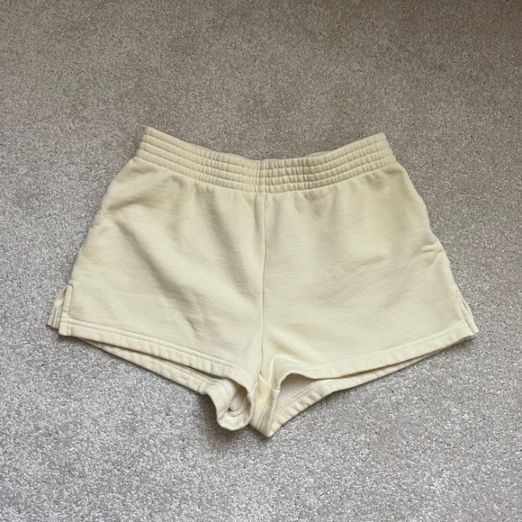 TNA Aritzia Just Cozy yellow sweatshorts - Picture 1 of 3